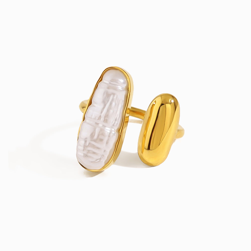 Gold ring JZ1429 with a central pearl-like stone on a white background