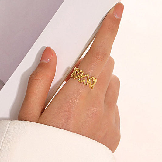 A Model Wearing Gold Adjustable Heart Ring JZ1258 - Stainless Steel