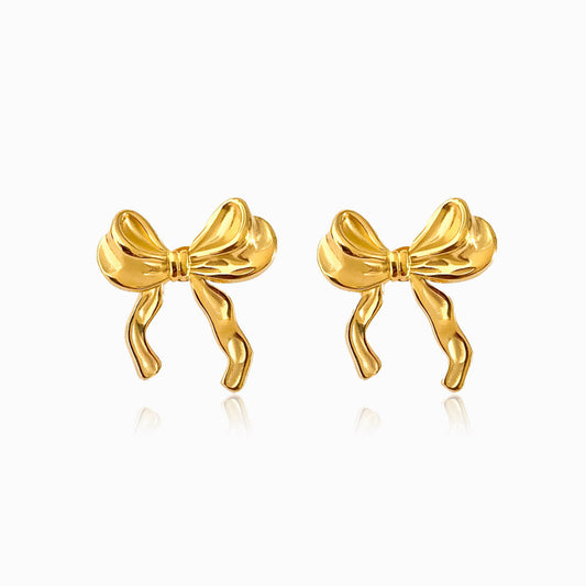 A pair of gold-colored bow earrings BR1213 made from stainless steel.